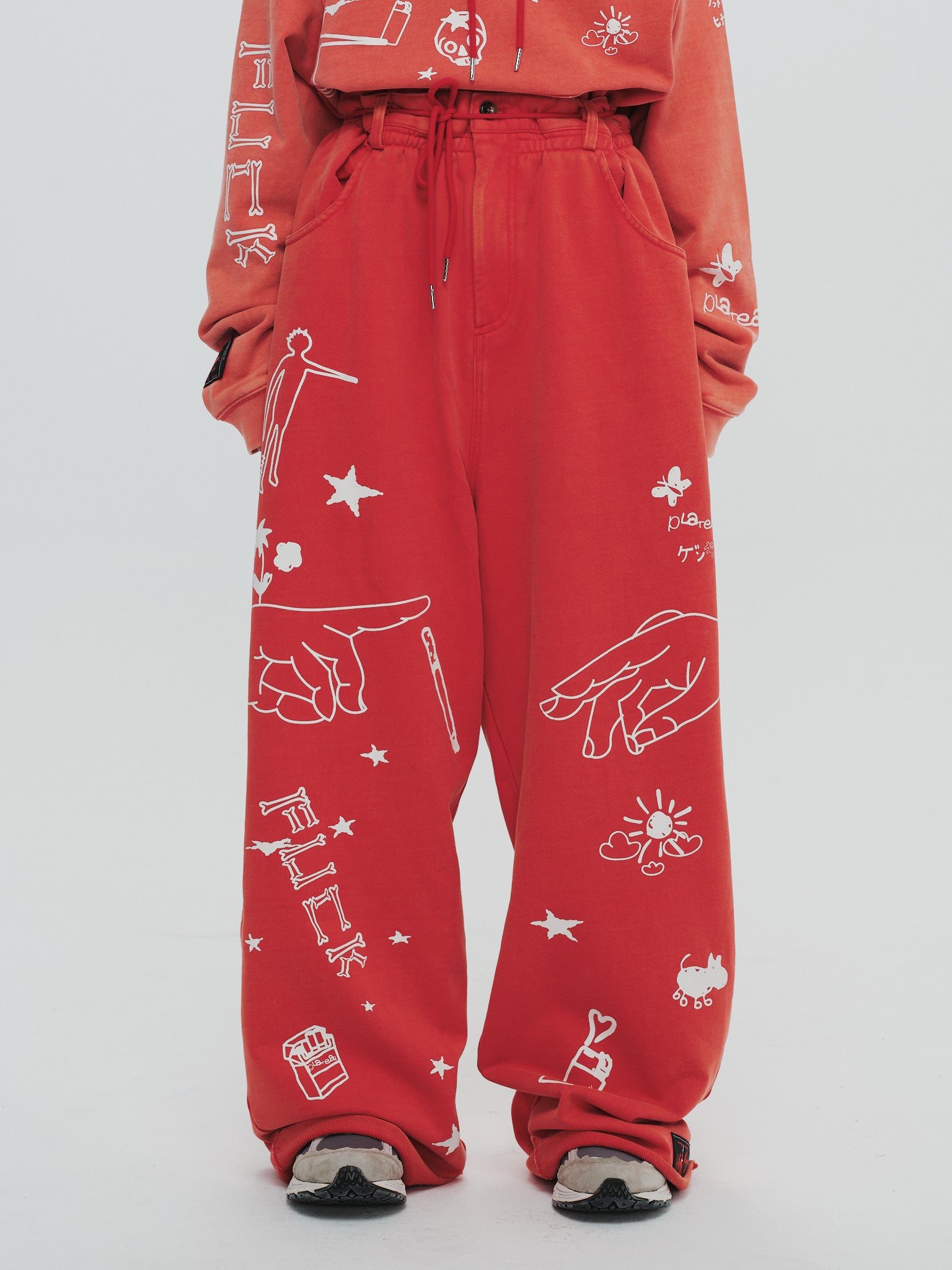 x SYU. Man illustrator pants