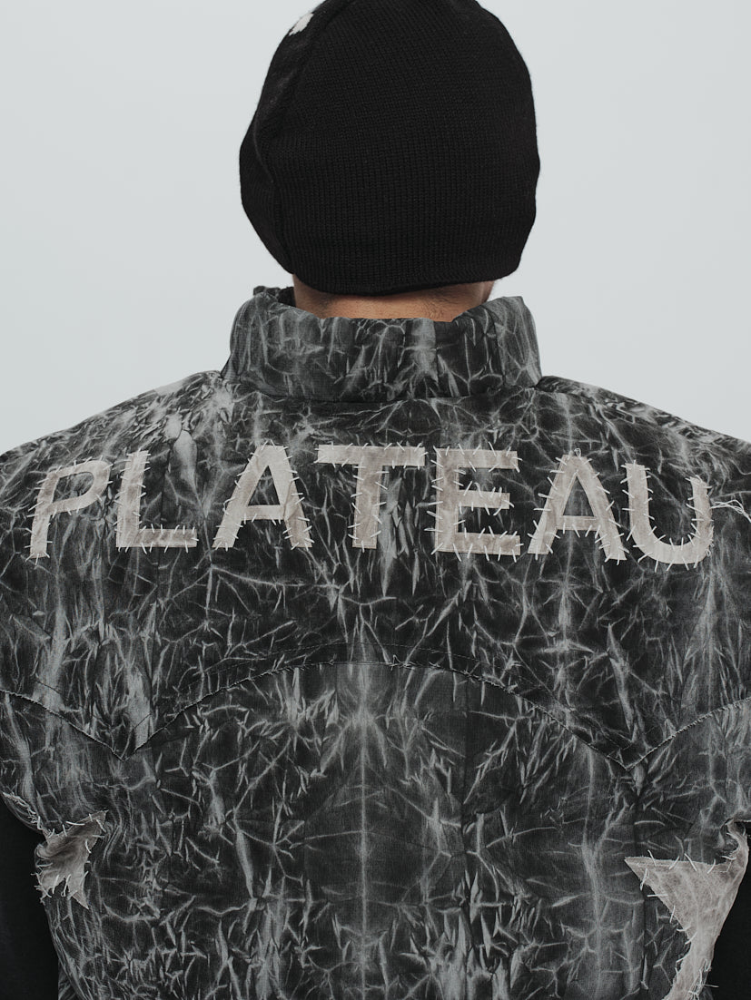 Hand stitch puffer vest